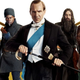 A grumpy, tuxedo-ed Ralph Fiennes stands in from of a leather jacket-clad Gemma Arterton, Rasputin, and other.